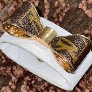 White Leather Bracelet with Brown Gold-Trim Bow